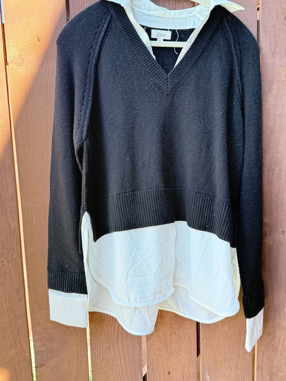 Chic Layered Black & White V-Neck Sweater